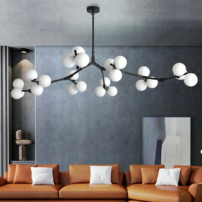 Black gold glass branch chandelier with frosted shades on iron arms