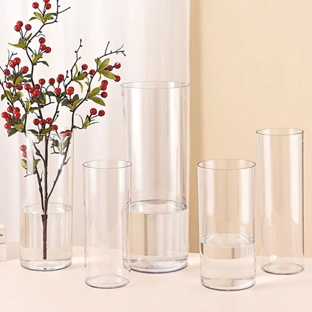 Large clear acrylic cylinder vase 15x40cm with tall white flower arrangement inside