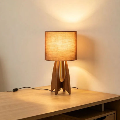 Coffee brown fabric table lamp on wooden desk neutral light mode