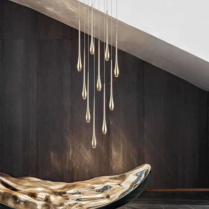 Three light gold branch chandelier for a bedside, study, or kitchen corner