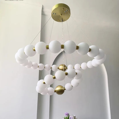 Modern acrylic ring chandelier with acrylic rings on an iron frame