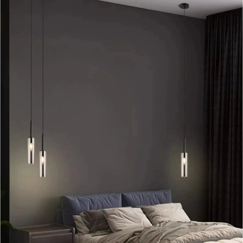 Twin head chandelier lighting two separate pools of warm light