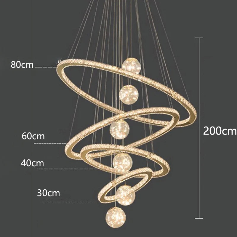 Stacked crystal rings on an ironwork staircase chandelier frame