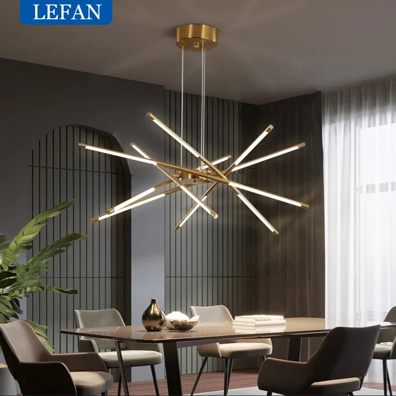 Gold multi head chandelier with plated alloy heads on slim arms