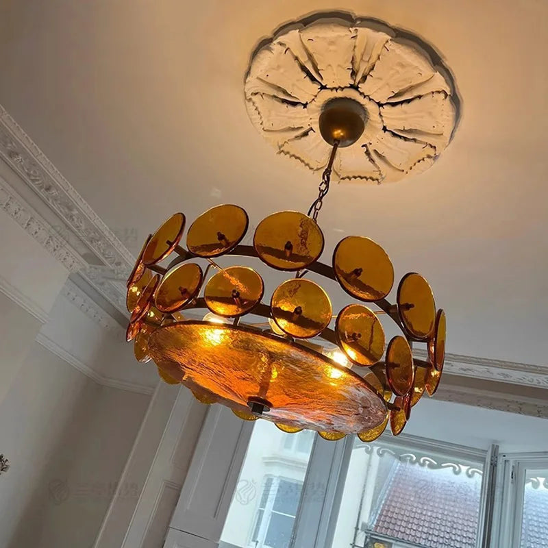 Green glass chandelier measuring 23.6 inches diameter by 11 inches in height