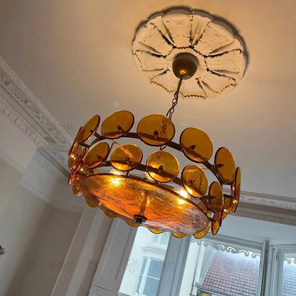 Green glass chandelier measuring 23.6 inches diameter by 11 inches in height