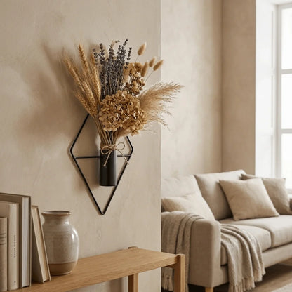 Set of two black metal rhombus-shaped wall hanging vases in minimalist wall arrangement