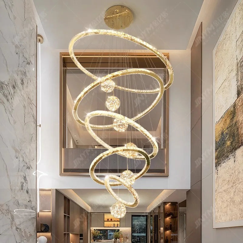 Crystal and ironwork ring chandelier for a tall stairwell void