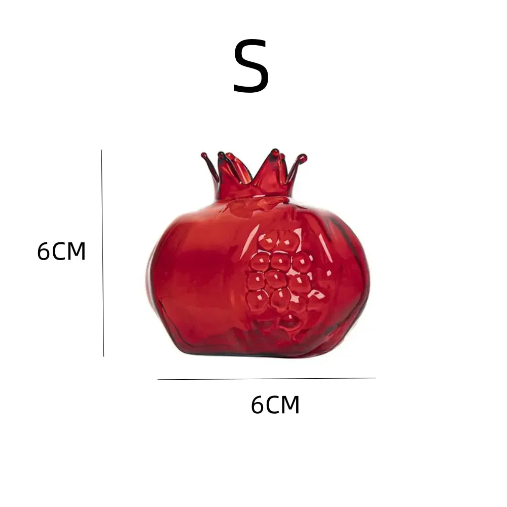 Transparent medium pomegranate vase with water and fresh stem cutting