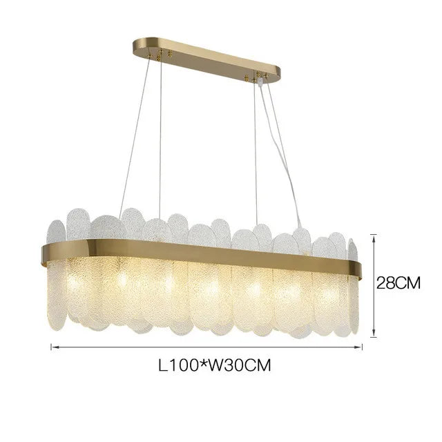 Modern gold glass chandelier mounted tight to a lower ceiling