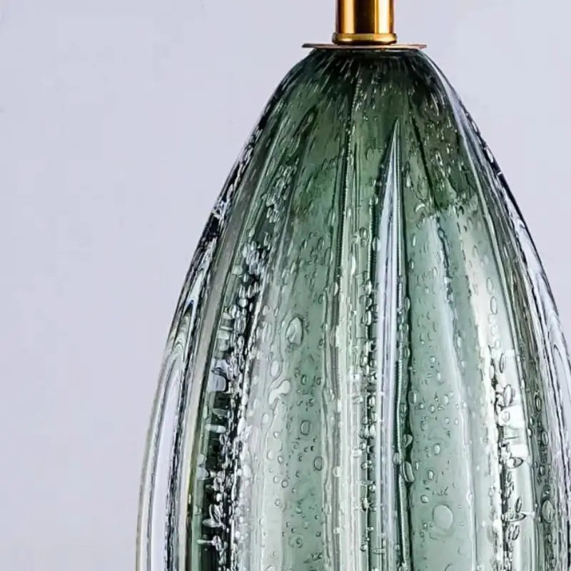 Glass lamp geometric form close-up showing elegant design detail