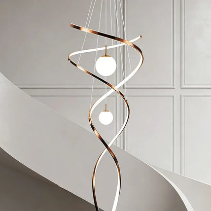 Crystal detail on an iron and stainless steel chandelier in rose gold