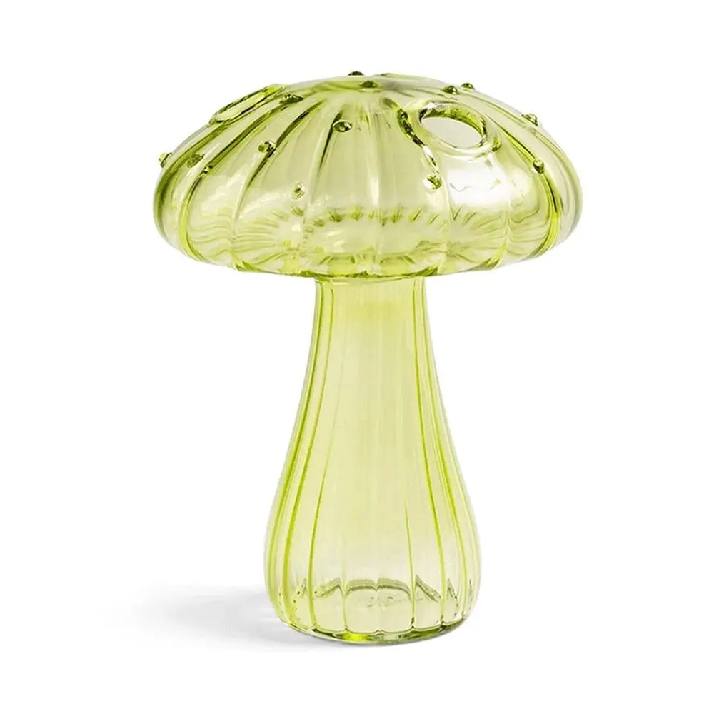 Five mushroom glass bud vases in all colors grouped as whimsical shelf display
