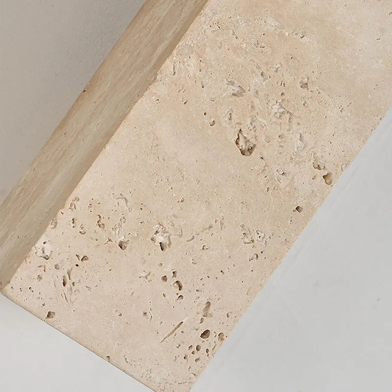 travertine stone outdoor wall sconce, detail view of fixture base and arm