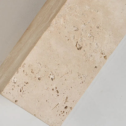 travertine stone outdoor wall sconce, detail view of fixture base and arm