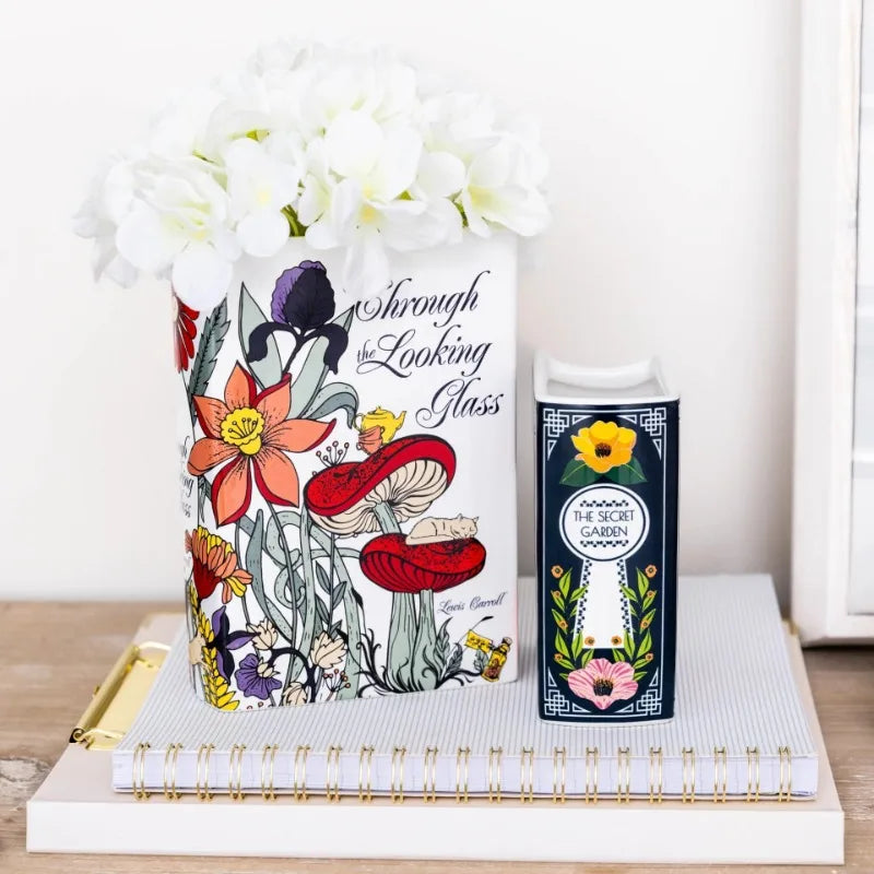 Ceramic book stack vase styled with a reading nook in Japandi interior