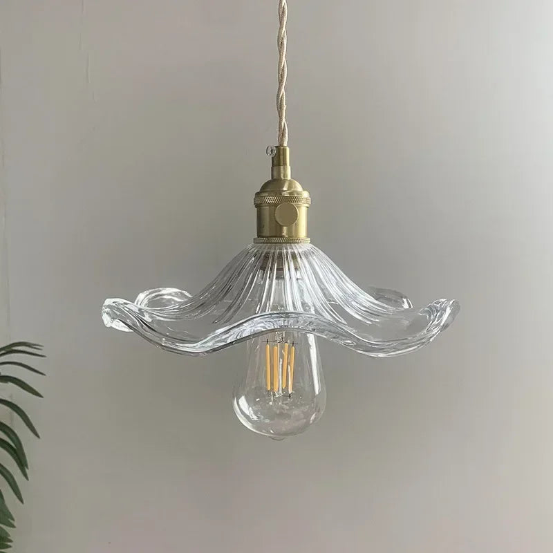 Nordic minimalist glass chandelier showing the copper canopy and slim cord drop
