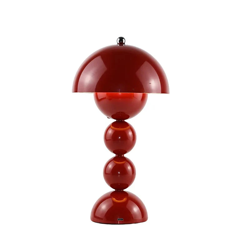 Side profile of metal flower bud lamp with touch switch on stem