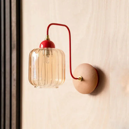 amber glass wall sconce, side profile showing mounting depth