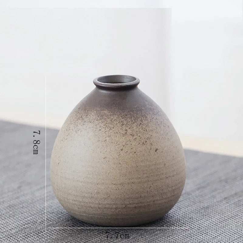 Retro Chinese ceramic vase placed on Japandi-styled natural wood shelf display