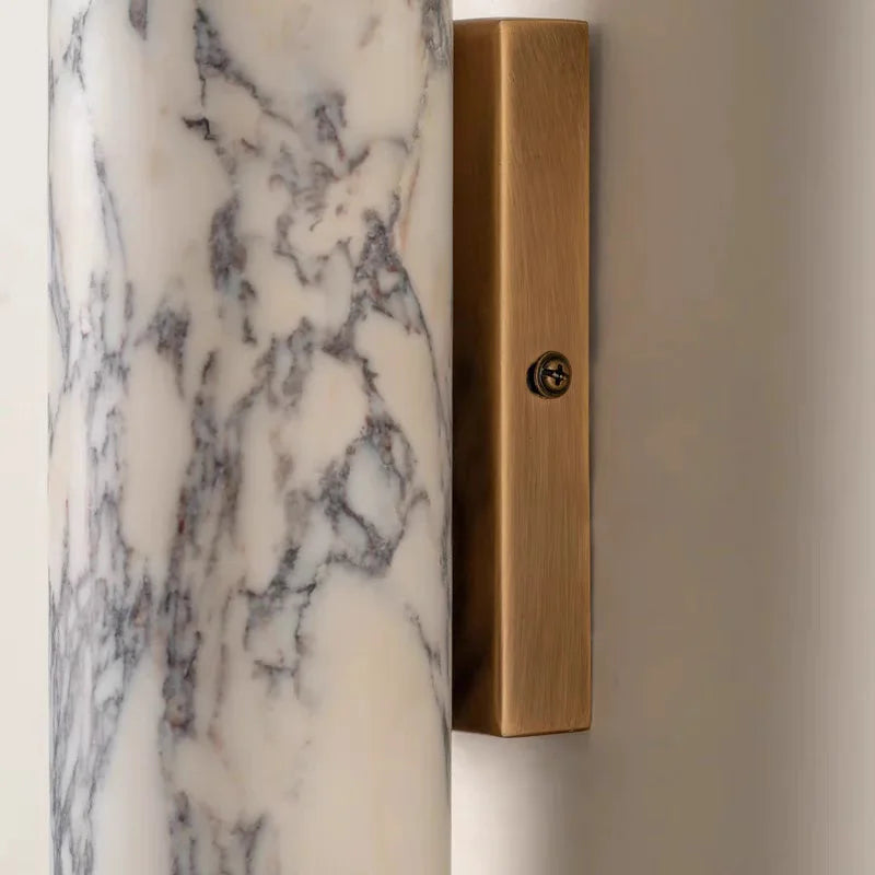 marble wall sconce, detail view of fixture base and arm