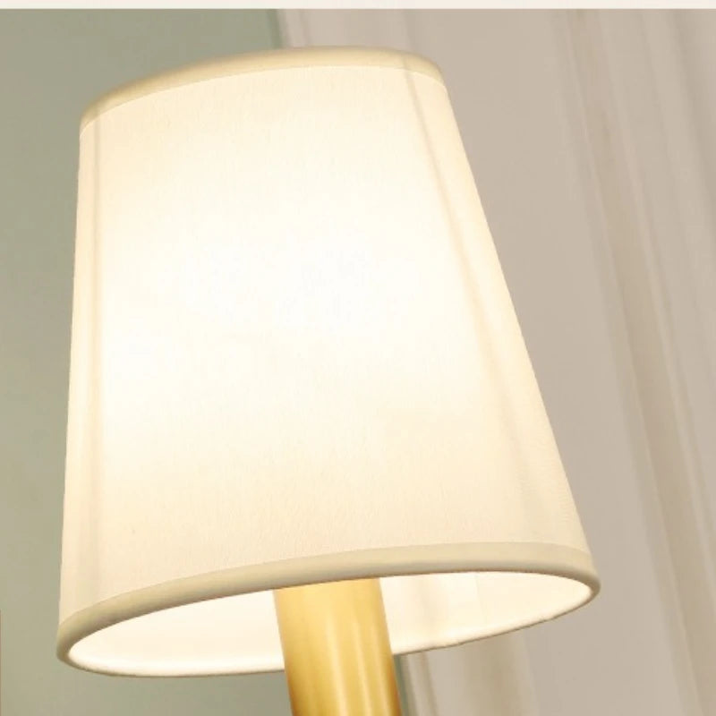 copper wall sconce, installed in a room interior setting