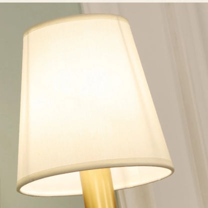 copper wall sconce, installed in a room interior setting