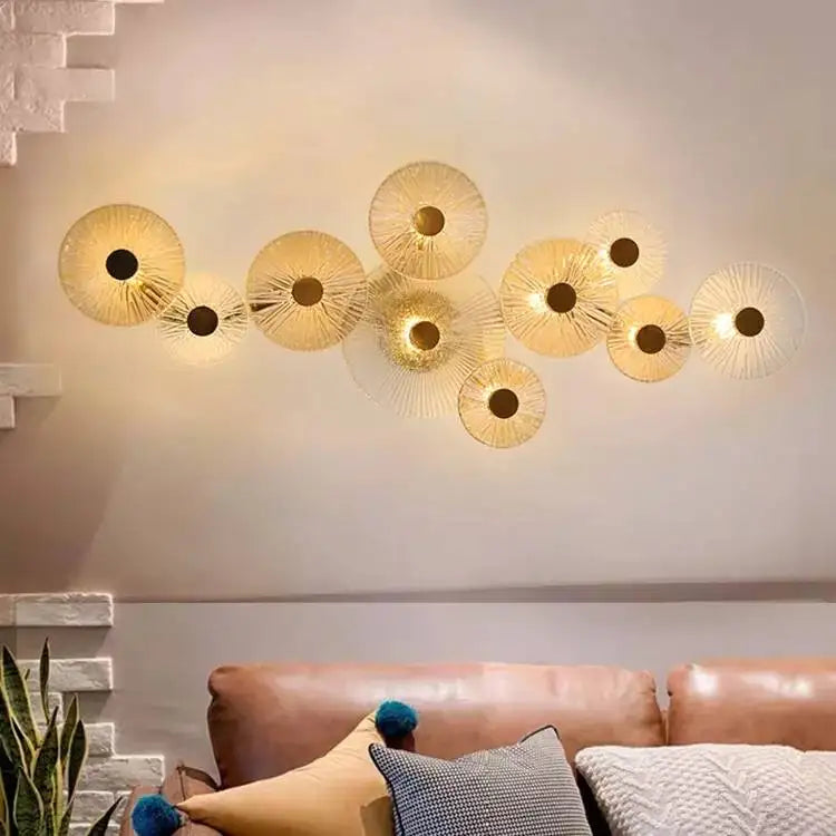 glass wall sconce, detail view of fixture base and arm