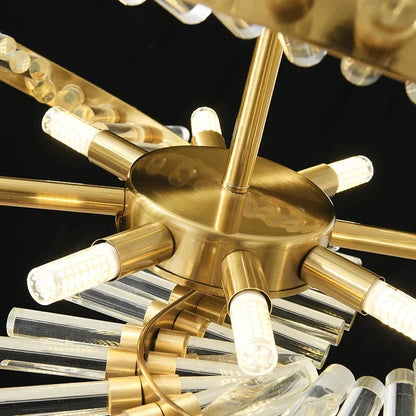 Glass globe chandelier in cold light on a plated gold iron structure