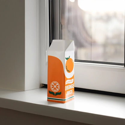 Ceramic orange vase holding a single green stem hydroponic display