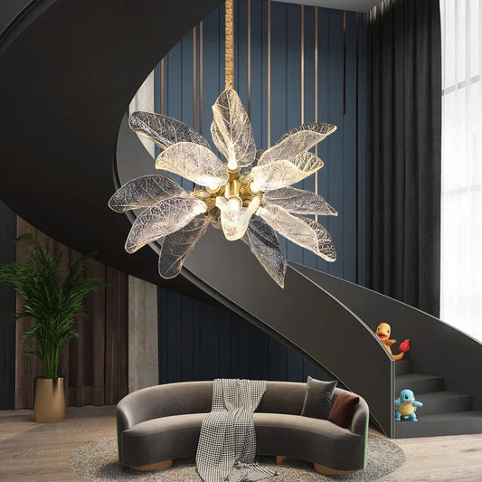 Metal leaf petal chandelier with overlapping acrylic petals on a gold frame