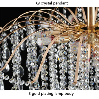 Fourteen head crystal chandelier at 31.5 in across on a cord pendant
