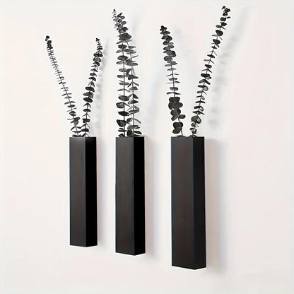 Rustic wood wall mounted vase on farmhouse interior wall with dried stems