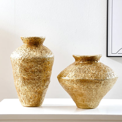Pair of antique gold earthenware jar vases both sizes displayed together on shelf