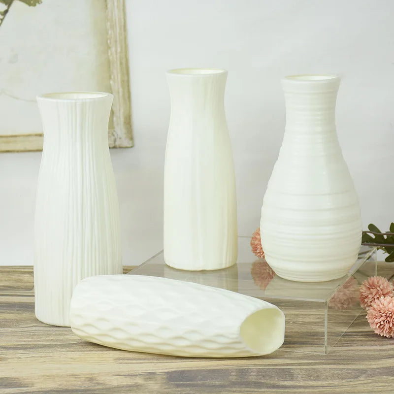 White plastic Nordic plant pot Z03 with trailing pothos plant on modern office desk
