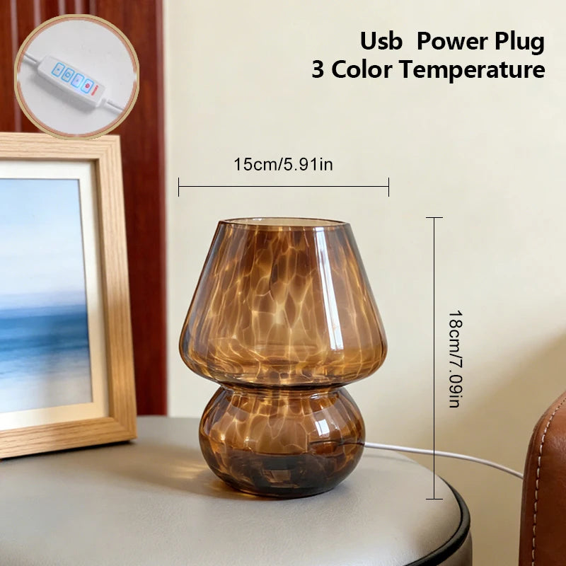 Side profile of glass mushroom table lamp showing base detail