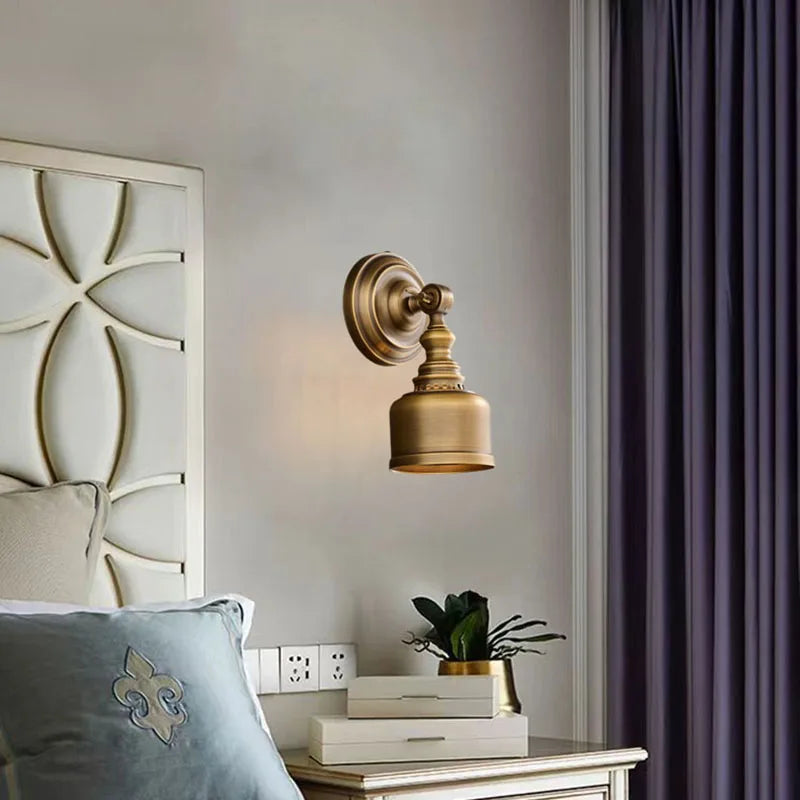 copper brass wall sconce, installed in a room interior setting
