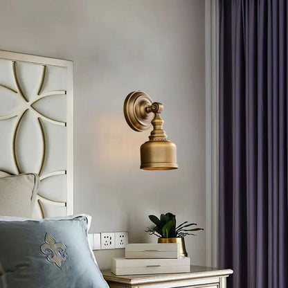copper brass wall sconce, installed in a room interior setting