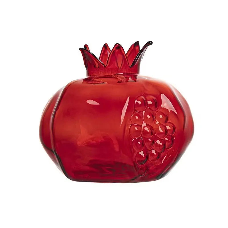 Overhead view of pomegranate glass vase crown opening and raised glass surface pattern