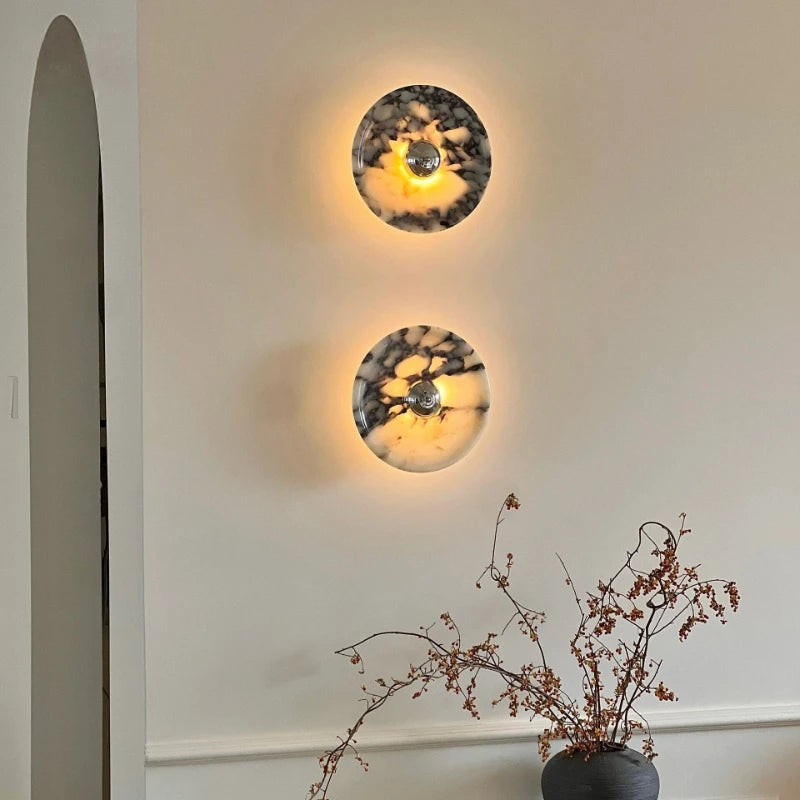 marble wall sconce, installed in a room interior setting