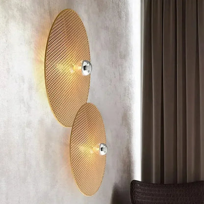 rattan wall sconce, installed in a room interior setting