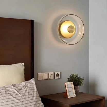 glass wall sconce, detail view of fixture base and arm