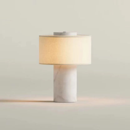 Yellow stone lamp side profile showing stone base and shade silhouette