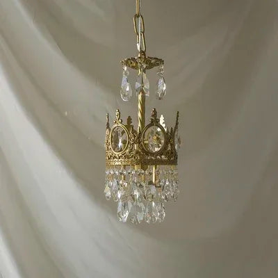 Crown crystal chandelier shown lit in warm white 3000K light