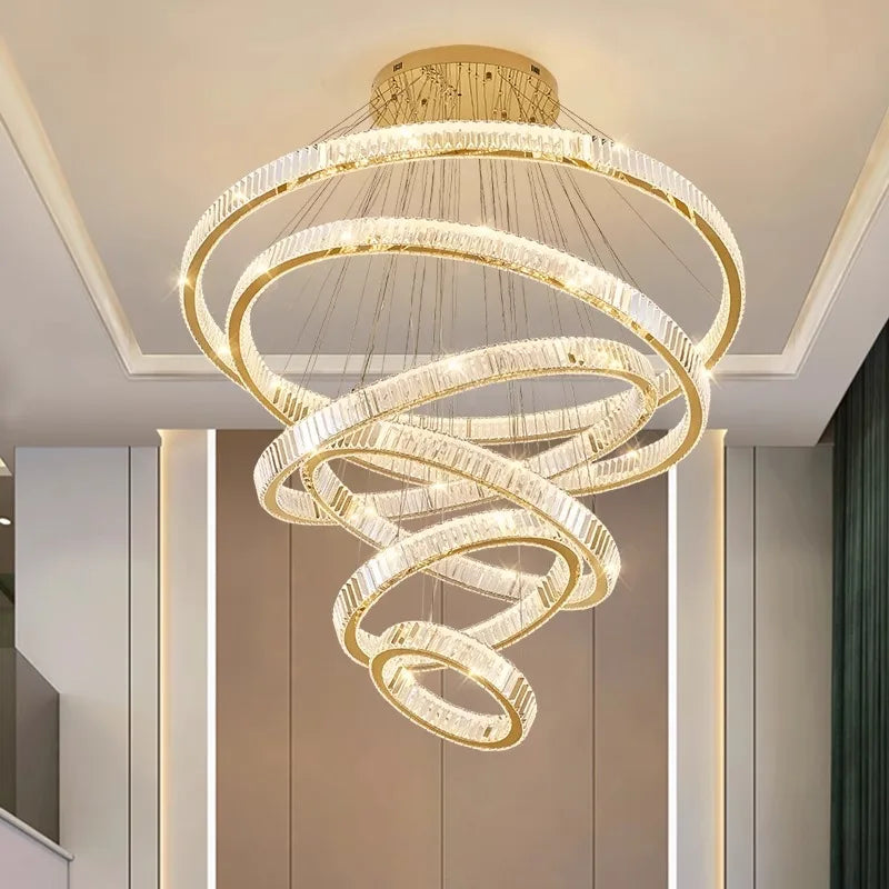 Eight ring crystal chandelier sized for a tall stairwell or grand entry