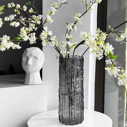 Transparent Style A glacier textured glass vase with fresh flowers on dining table