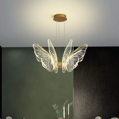 Butterfly chandelier lit in warm light above a dining table