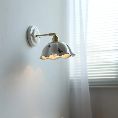 brass wall sconce, close-up of shade and hardware detail