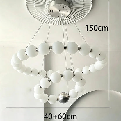 Neutral light setting on a modern acrylic ring chandelier