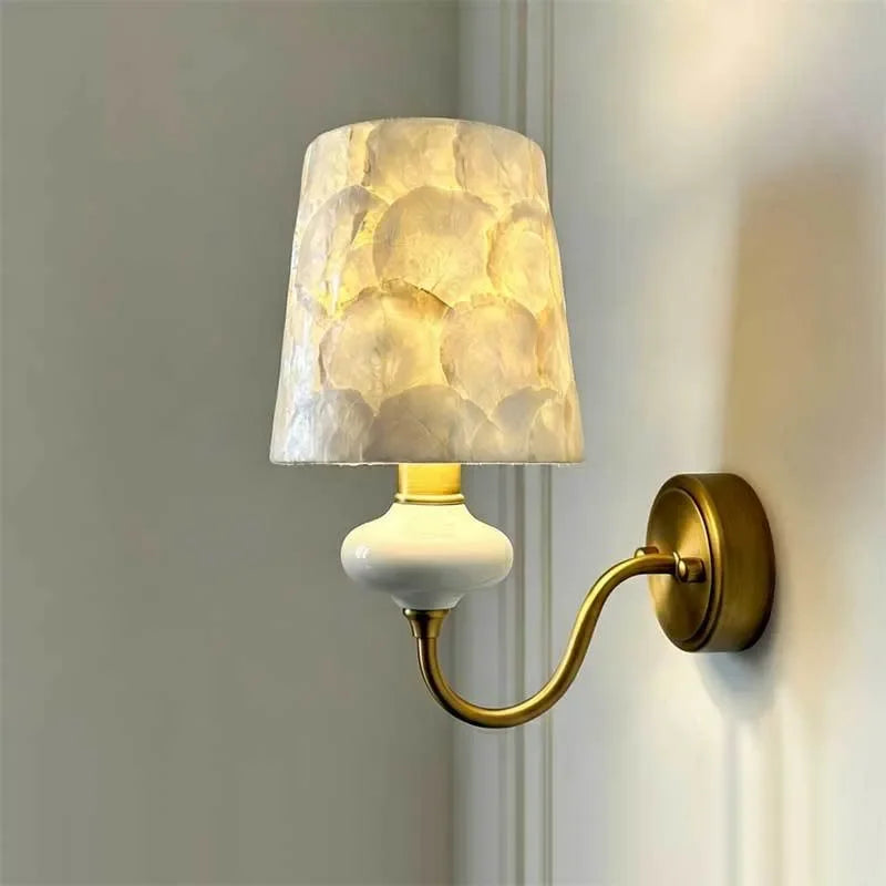 ceramic wall sconce, front view on white background